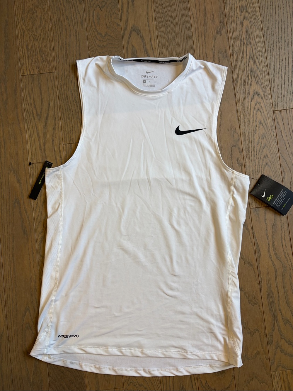 Nike White Men’s Sleeveless Dri-FIT Training Tank with Black Swoosh